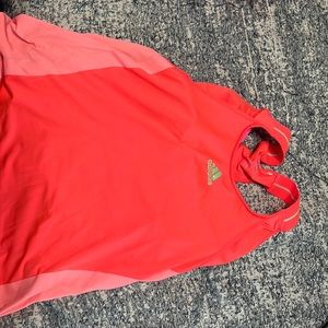 Adidas tennis tank. Size xl.  Orange. White netting. Has bra built in.